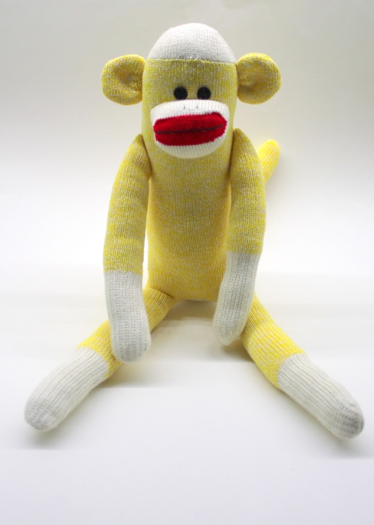 yellow stuffed monkey